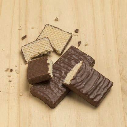 My Dulce Hogar Jet chocolate covered vanilla wafers with crispy layers on a wooden surface
